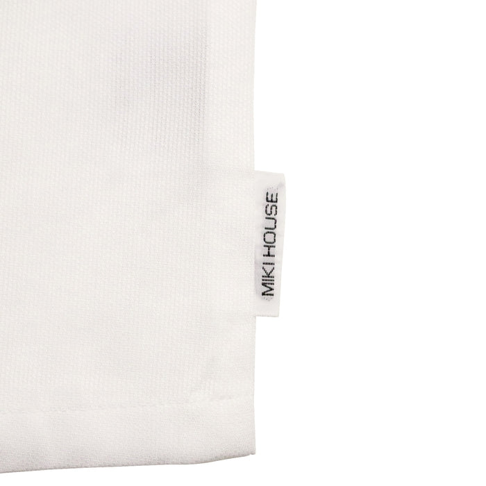 刺繍入りピケ素材のフリル付きブラウス